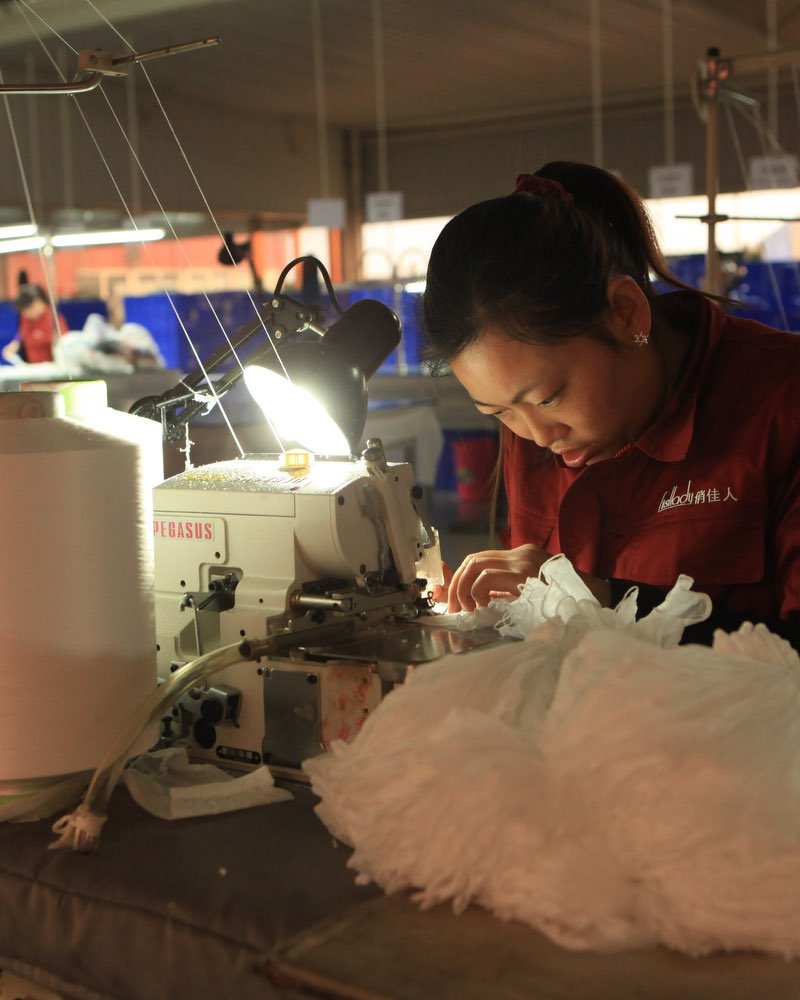 Precision toe linking and gusset sewing process using Pegasus industrial machines at Sichuan Firstlady Knitting Co., Ltd.